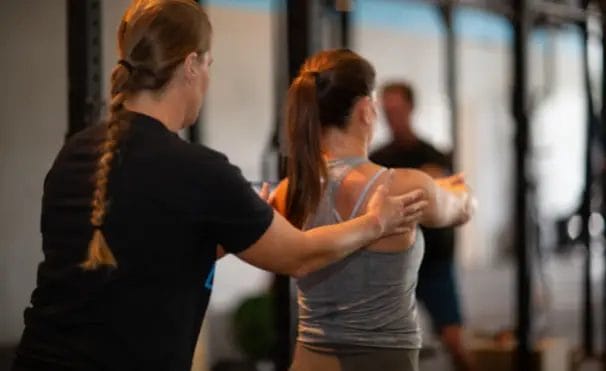 CrossFit Rutherford Woman with Coach Presonal Training