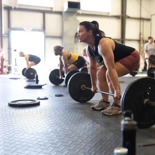 Women lifting barbells at CrossFit Rutherford